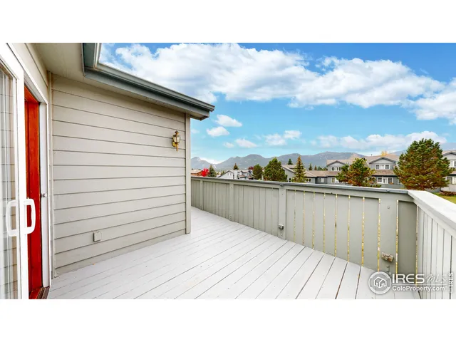 a bathroom with a sink and glass door