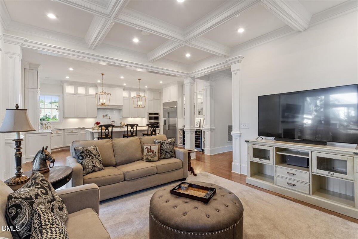 1713 Oberlin Road Raleigh, NC 27608 - Photo 11 of 53 a living room with furniture and a flat screen tv