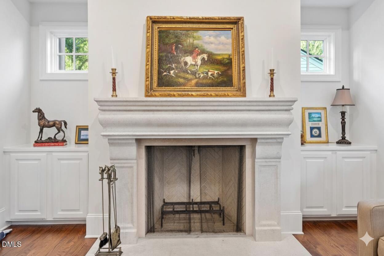 1713 Oberlin Road Raleigh, NC 27608 - Photo 13 of 53 a view of a hallway with wooden floor and a window