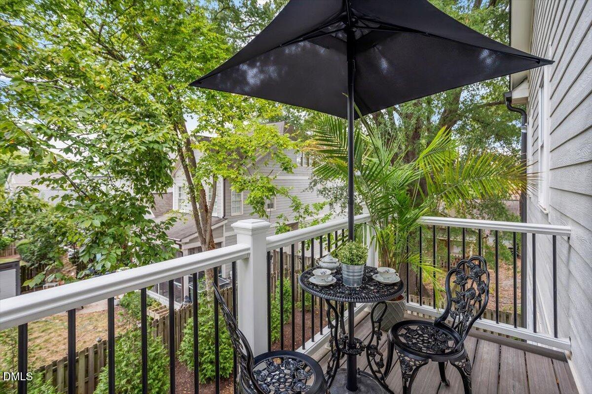 1713 Oberlin Road Raleigh, NC 27608 - Photo 30 of 53 a view of a balcony with wooden floor