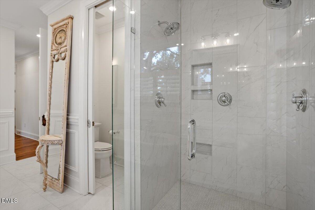 1713 Oberlin Road Raleigh, NC 27608 - Photo 32 of 53 a bathroom with a shower and a sink