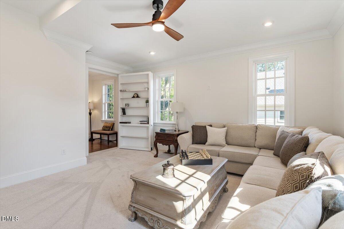 1713 Oberlin Road Raleigh, NC 27608 - Photo 47 of 53 a living room with furniture and a large window