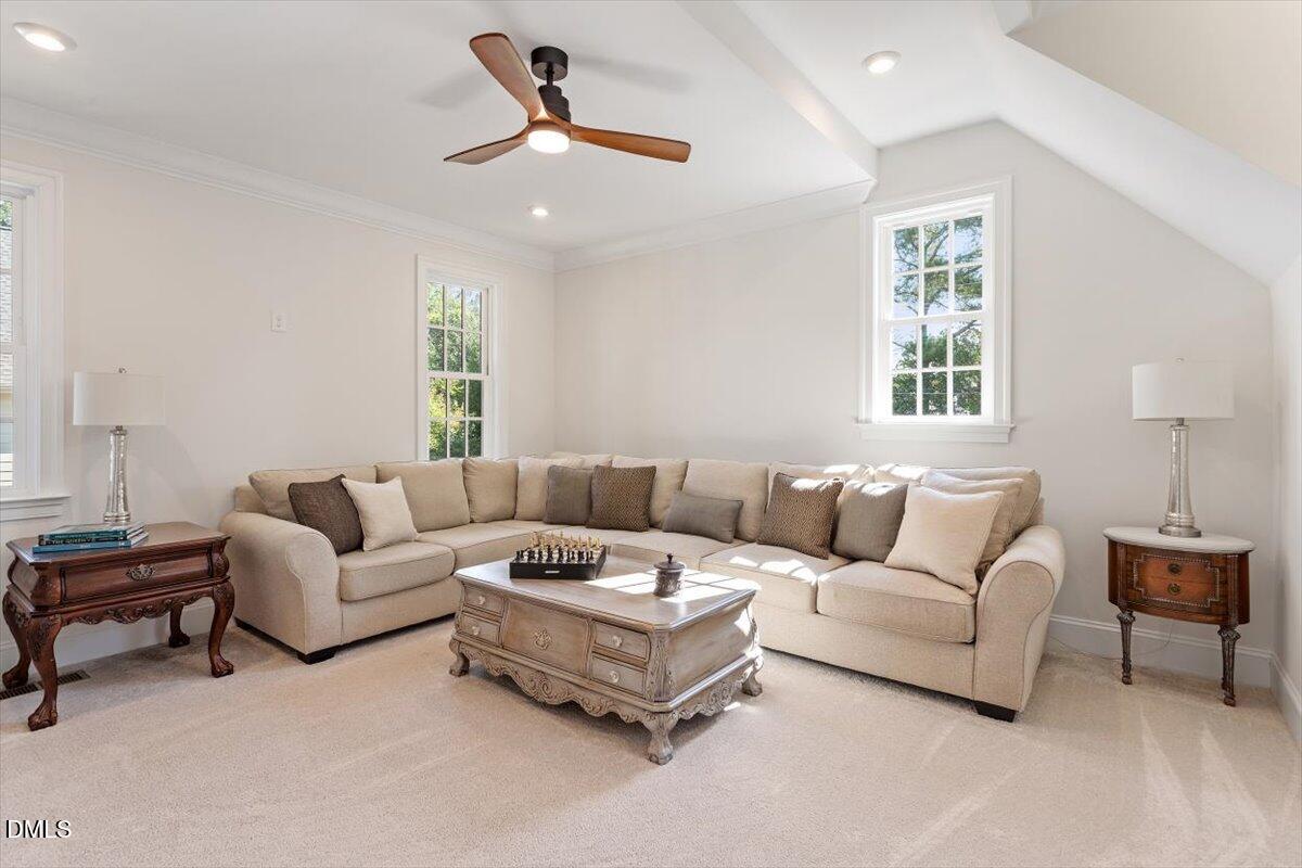 1713 Oberlin Road Raleigh, NC 27608 - Photo 48 of 53 a living room with furniture and a large window