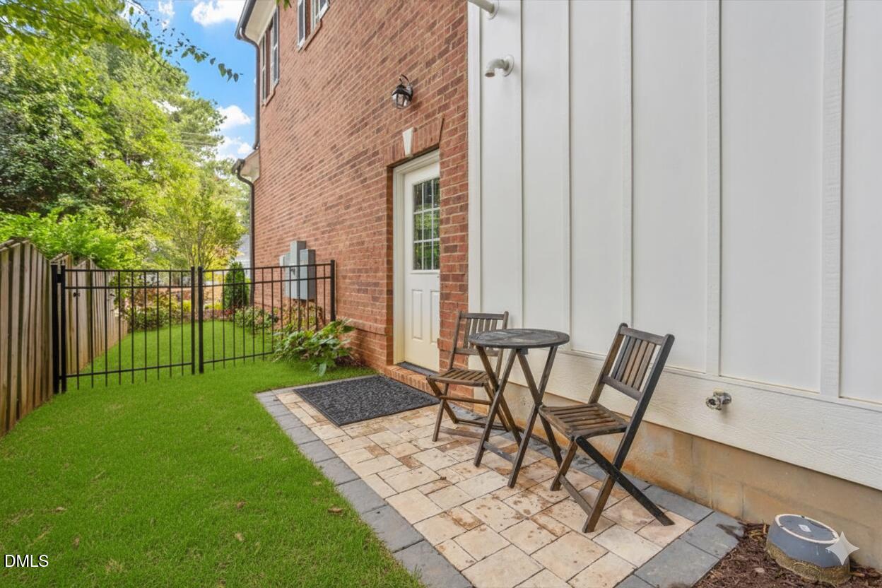 1713 Oberlin Road Raleigh, NC 27608 - Photo 51 of 53 a view of a backyard with furniture