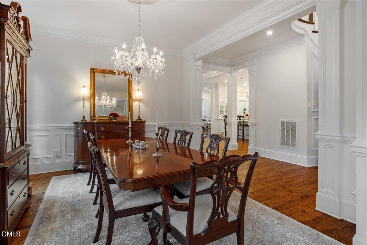 1713 Oberlin Road Raleigh, NC 27608 - Photo 10 of 53 a view of a dining room with furniture and chandelier