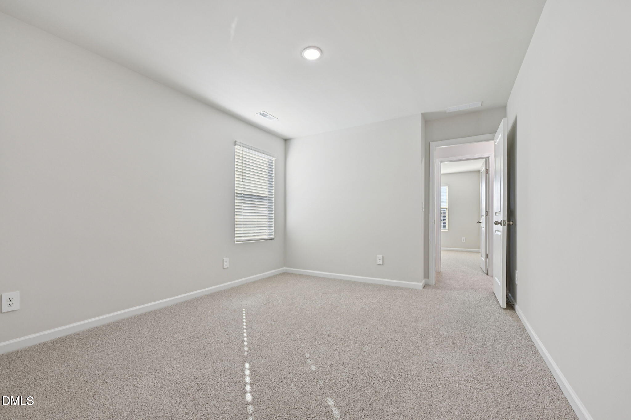 2145 Topsail Road Durham, NC 27703 - Photo 38 of 49 an empty room with windows and closet