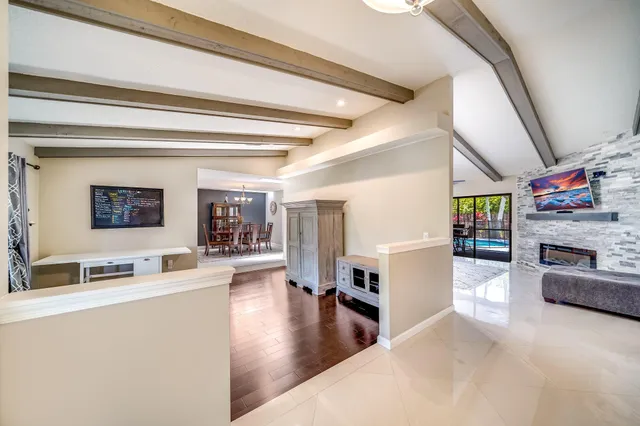 a living room with furniture and a table