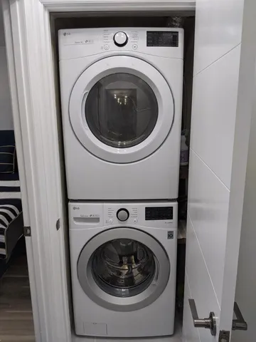 a view of a lake with a building in the background