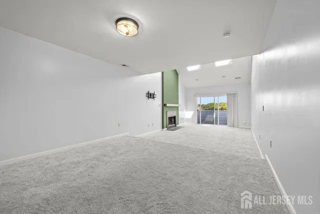 a view of a livingroom with a fireplace