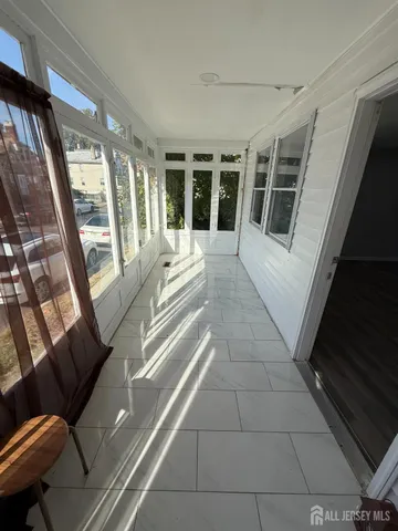 a view of a porch with chairs
