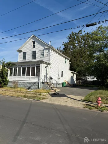 a view of a house with a street