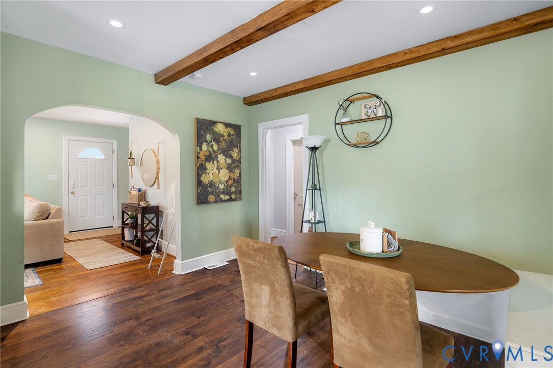2519 Maplewood Road Henrico, VA 23228 - Photo 13 of 41 a view of a dining room with furniture wooden floor and a clock