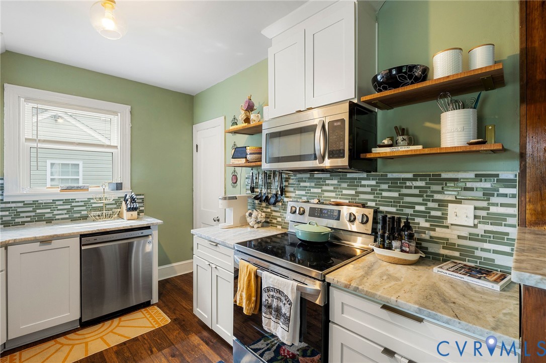 2519 Maplewood Road Henrico, VA 23228 - Photo 15 of 41 a kitchen with a stove and a microwave