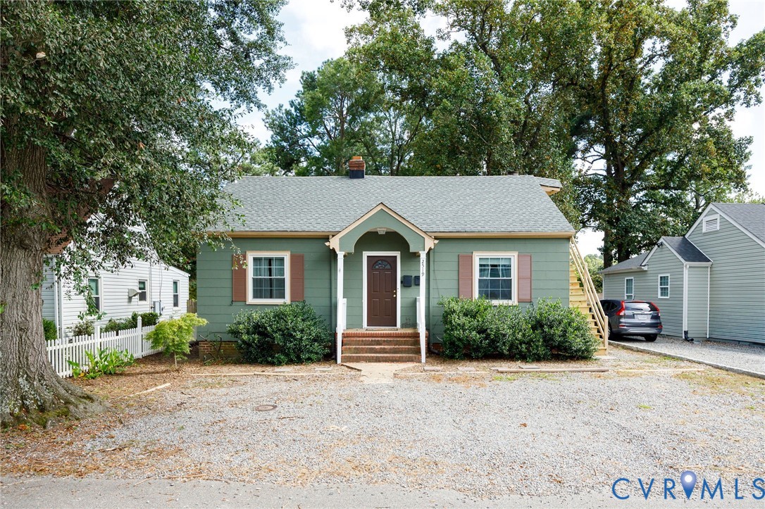 2519 Maplewood Road Henrico, VA 23228 - Photo 2 of 41 a front view of a house with a yard and garage