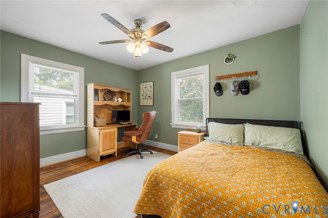 2519 Maplewood Road Henrico, VA 23228 - Photo 21 of 41 a bedroom with a bed and wooden floor