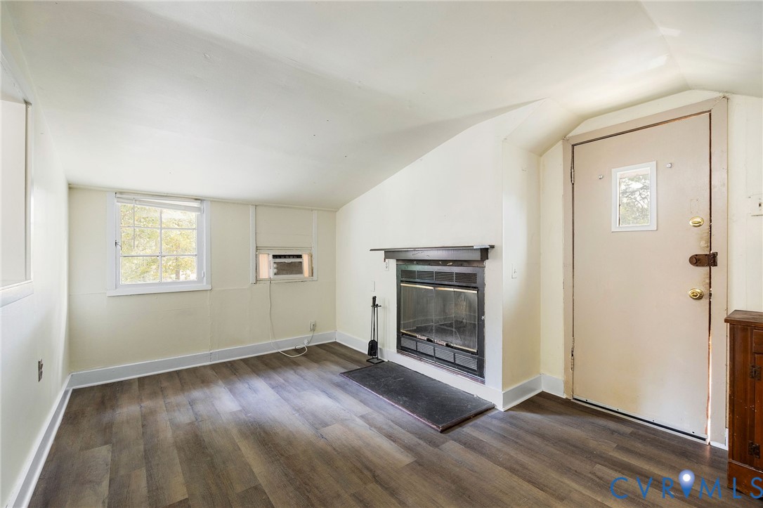 2519 Maplewood Road Henrico, VA 23228 - Photo 24 of 41 a view of empty room with a fireplace and wooden floor