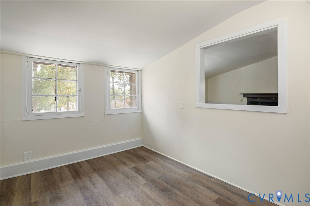 2519 Maplewood Road Henrico, VA 23228 - Photo 27 of 41 a view of an empty room with wooden floor and a window