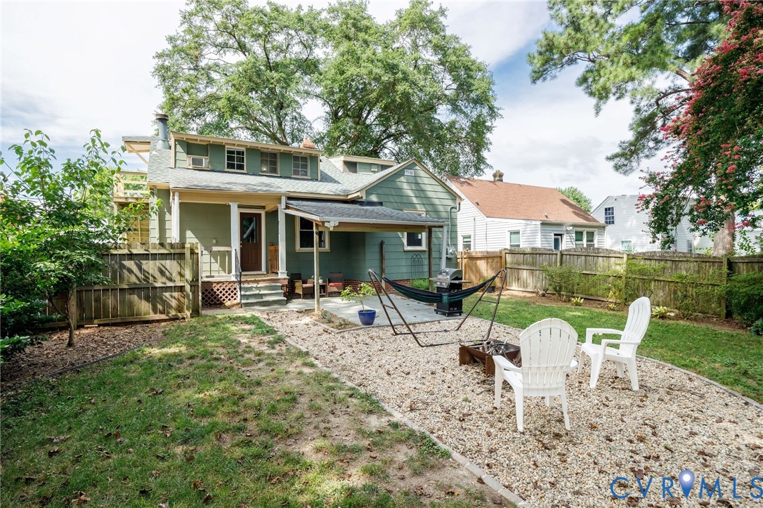 2519 Maplewood Road Henrico, VA 23228 - Photo 38 of 41 a view of a house with backyard sitting area and garden