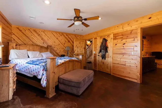 a view of a lake with houses in the background