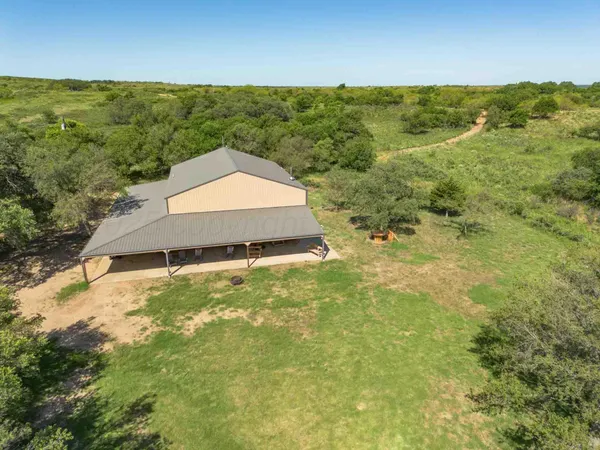 a room with furniture and wooden floor