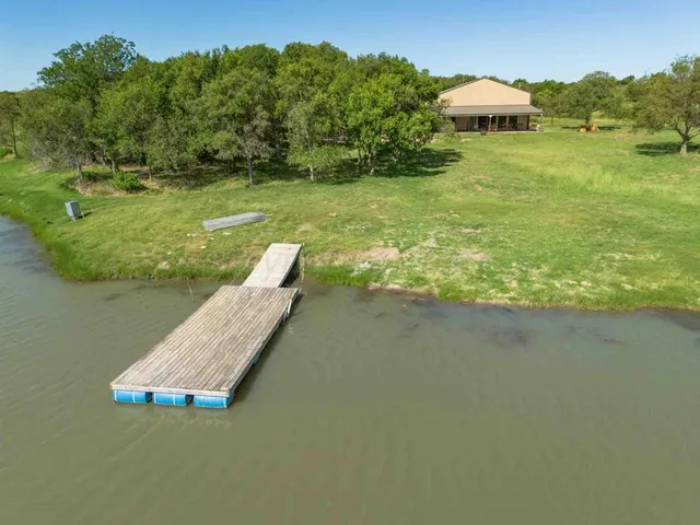 a view of entryway with stairs and wooden floor