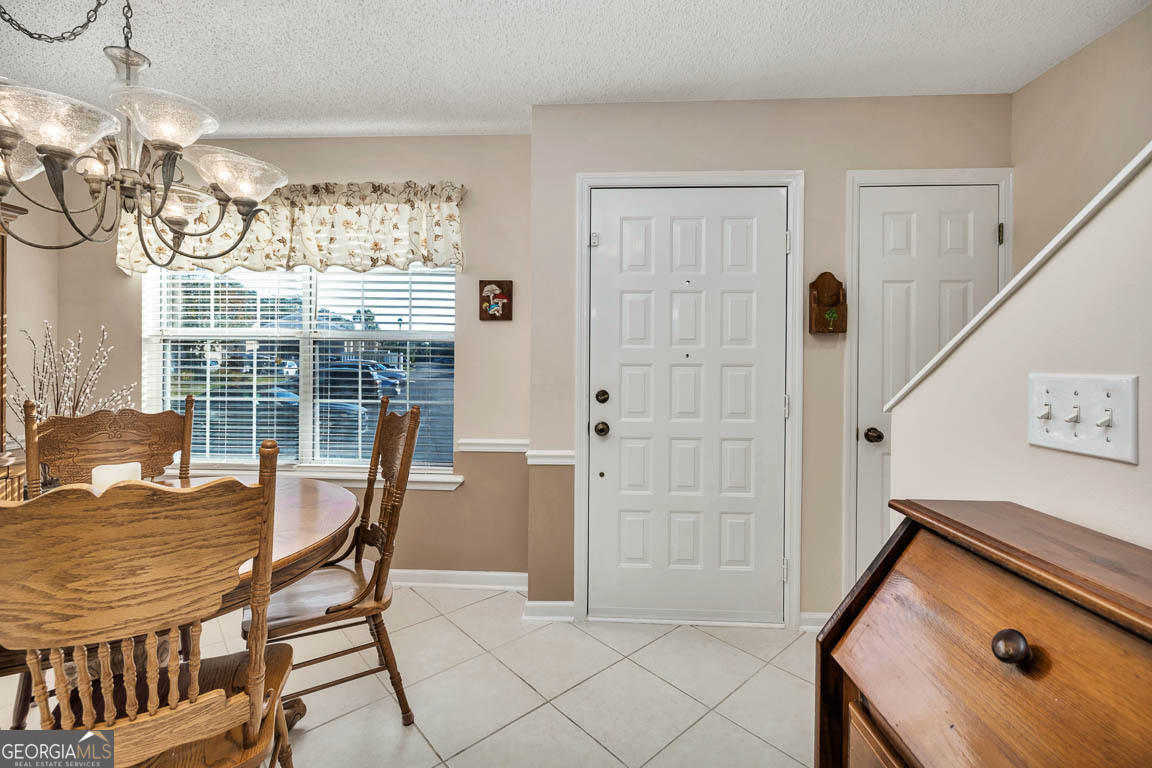 1000 Mallery Street, Unit D27 St. Simons, GA 31522 - Photo 14 of 34 a view of a livingroom with furniture and windows