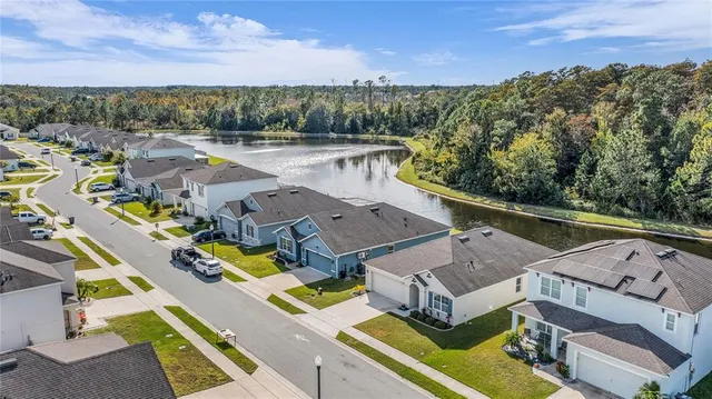 an aerial view of a house with a garden
