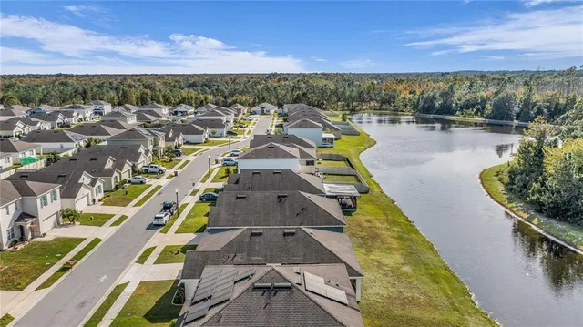 a view of a swimming pool with a lake view