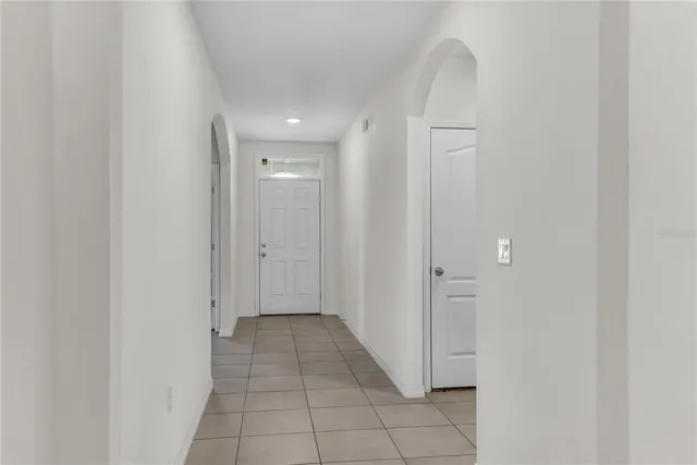 a view of a hallway with closet area