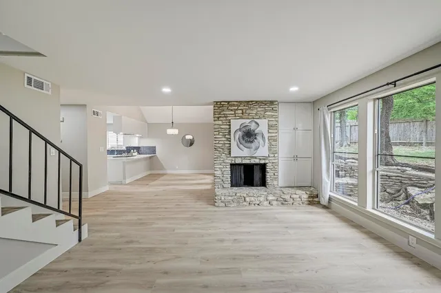 a view of kitchen with furniture and large window