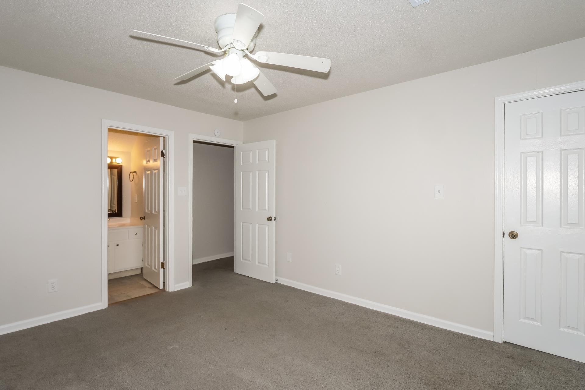 4696 Crestfield Road Millington, TN 38053 - Photo 8 of 17 Unfurnished bedroom featuring carpet, ensuite bathroom, and ceiling fan