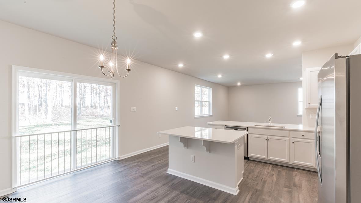 1564 Somers Point Road Egg Harbor Township, NJ 08234 - Photo 6 of 19 a large white kitchen with a large window