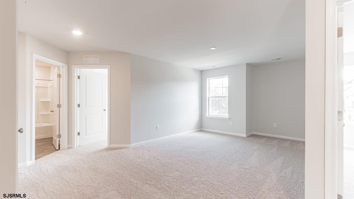1564 Somers Point Road Egg Harbor Township, NJ 08234 - Photo 8 of 19 a view of an empty room with a window