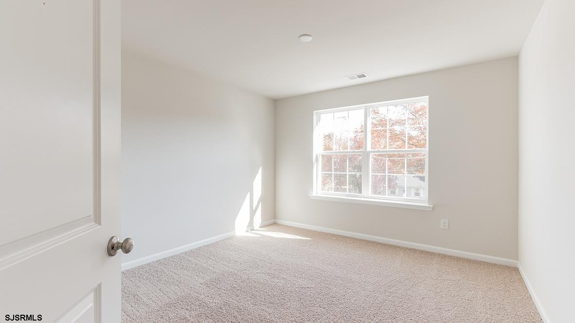 1564 Somers Point Road Egg Harbor Township, NJ 08234 - Photo 9 of 19 a view of an empty room with a window