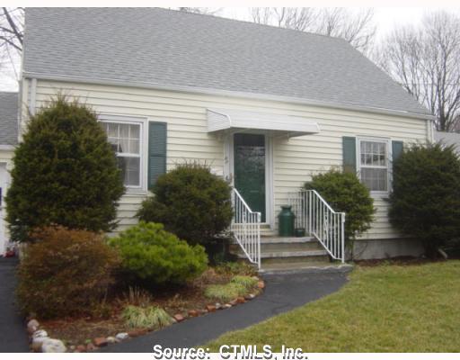 42 Washington Road Hamden, CT 06518 - Photo 1 of 1 front view of house with a yard
