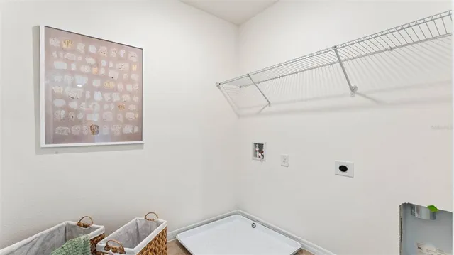 a bathroom with a window and a shower