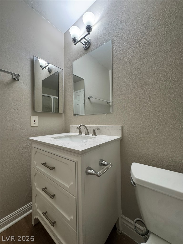5141 South Lindell Road, Unit 102 Las Vegas, NV 89118 - Photo 15 of 17 A well-appointed bathroom features a contemporary vanity and stylish fixtures.
