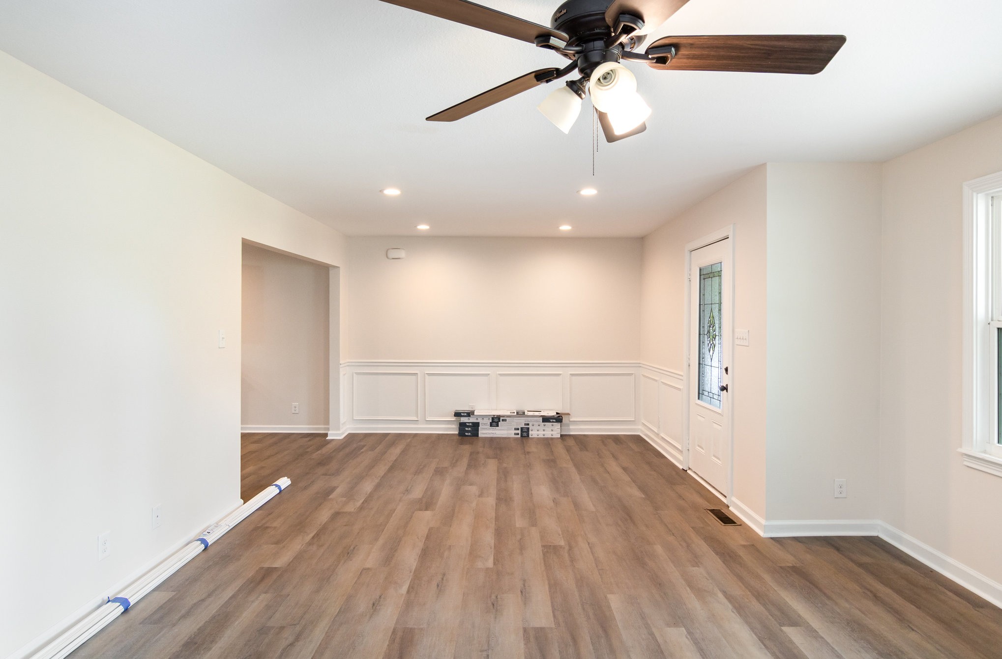 2557 Woodlawn Road Woodlawn, TN 37191 - Photo 11 of 40 wooden floor in an empty room with a window