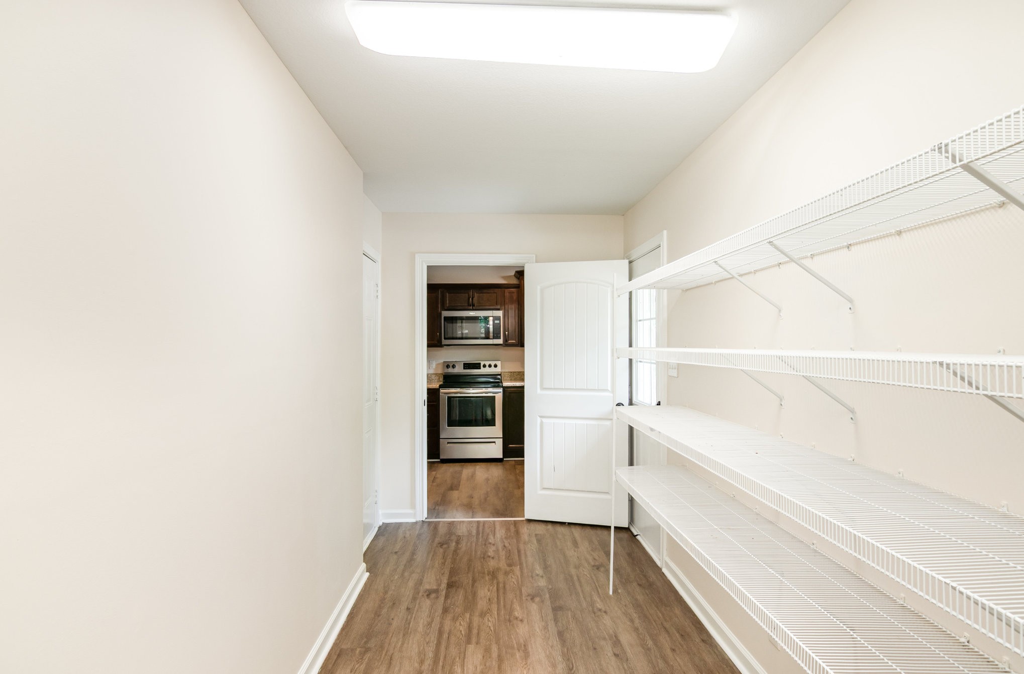 2557 Woodlawn Road Woodlawn, TN 37191 - Photo 16 of 40 a view of walk in closet with empty racks