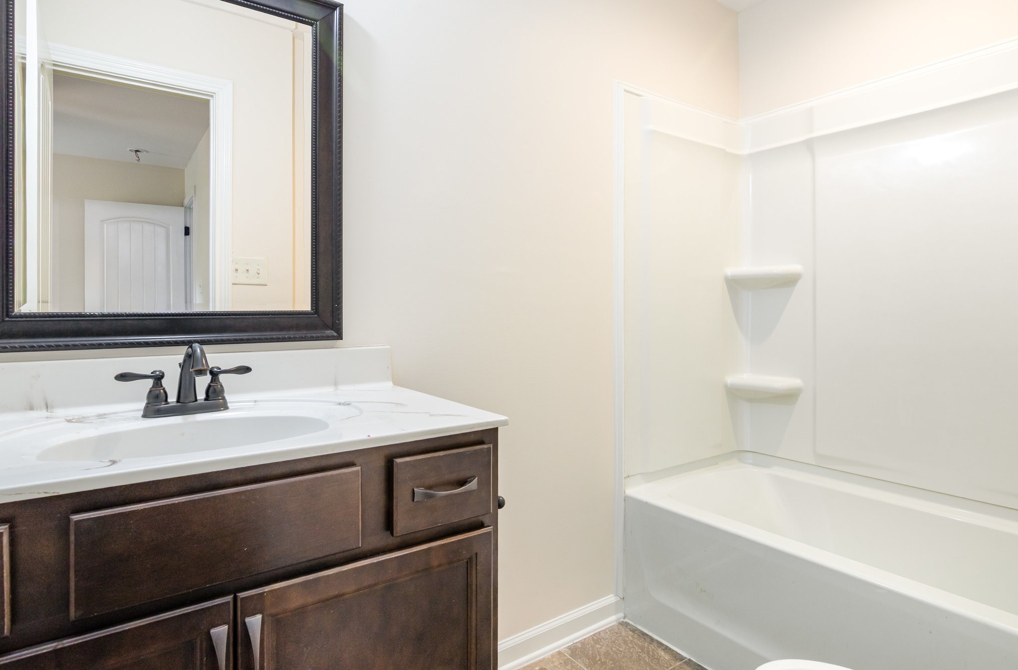 2557 Woodlawn Road Woodlawn, TN 37191 - Photo 20 of 40 a bathroom with a sink and a bathtub
