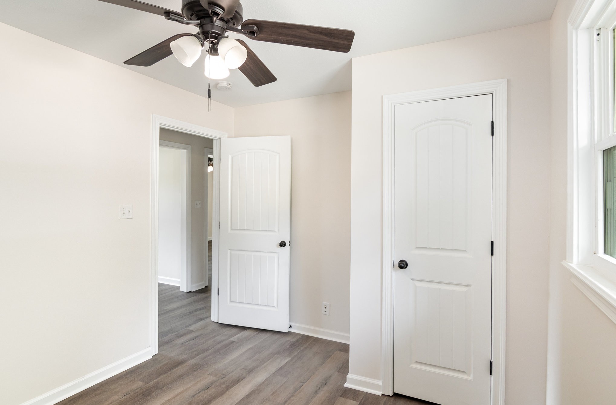 2557 Woodlawn Road Woodlawn, TN 37191 - Photo 23 of 40 wooden floor in an empty room