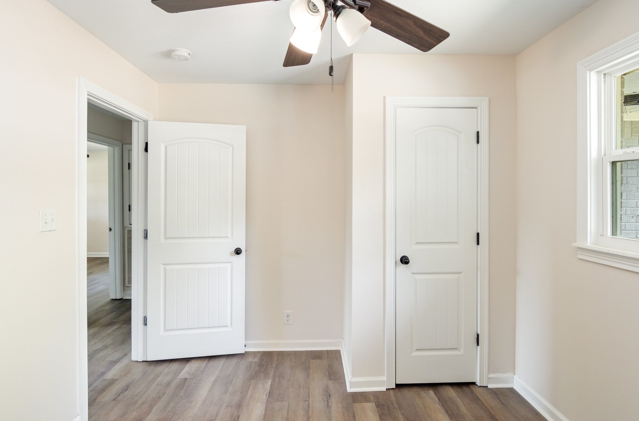 2557 Woodlawn Road Woodlawn, TN 37191 - Photo 24 of 40 an empty room with wooden floor