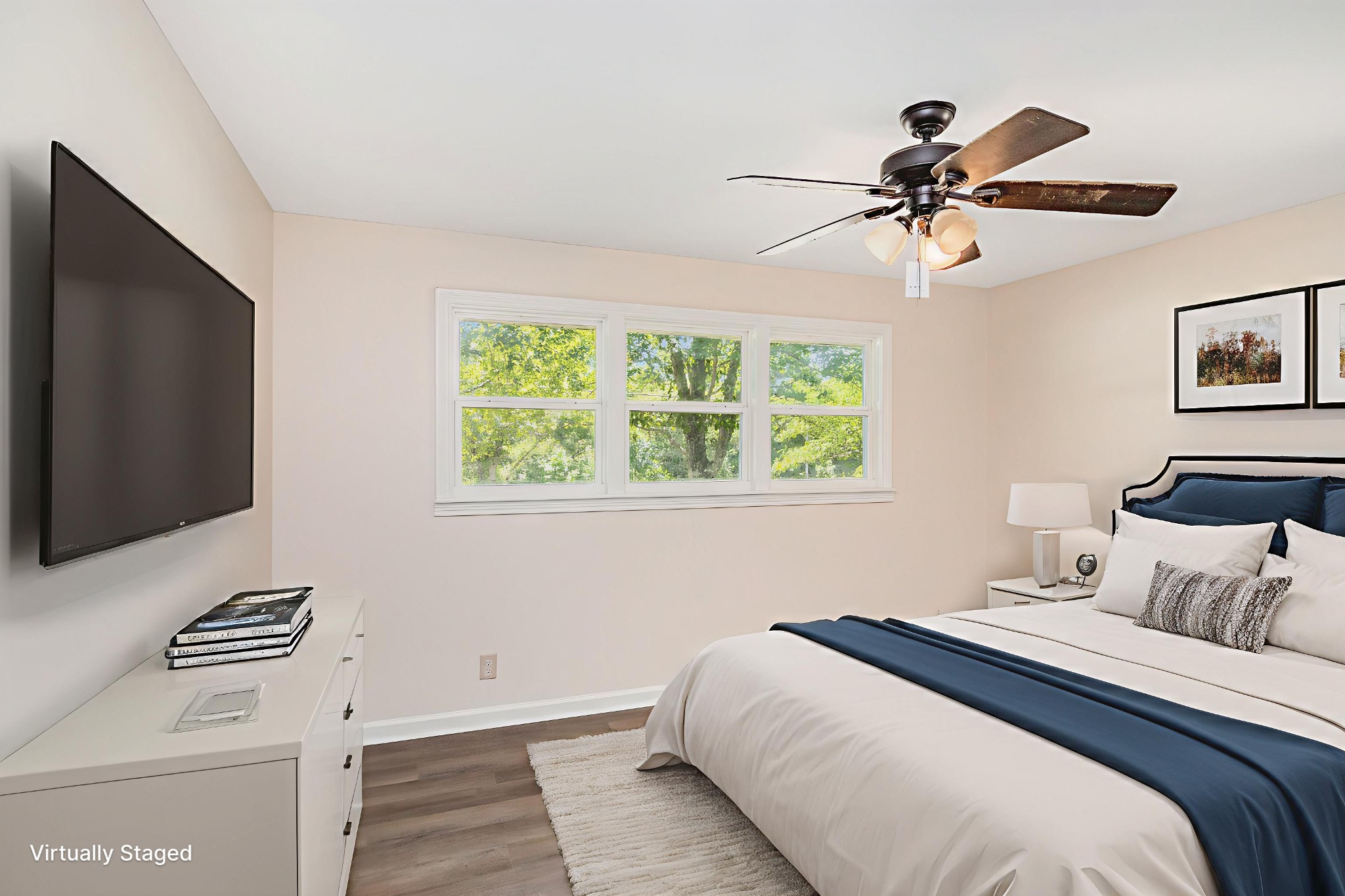 2557 Woodlawn Road Woodlawn, TN 37191 - Photo 26 of 40 a bedroom with a bed and a window
