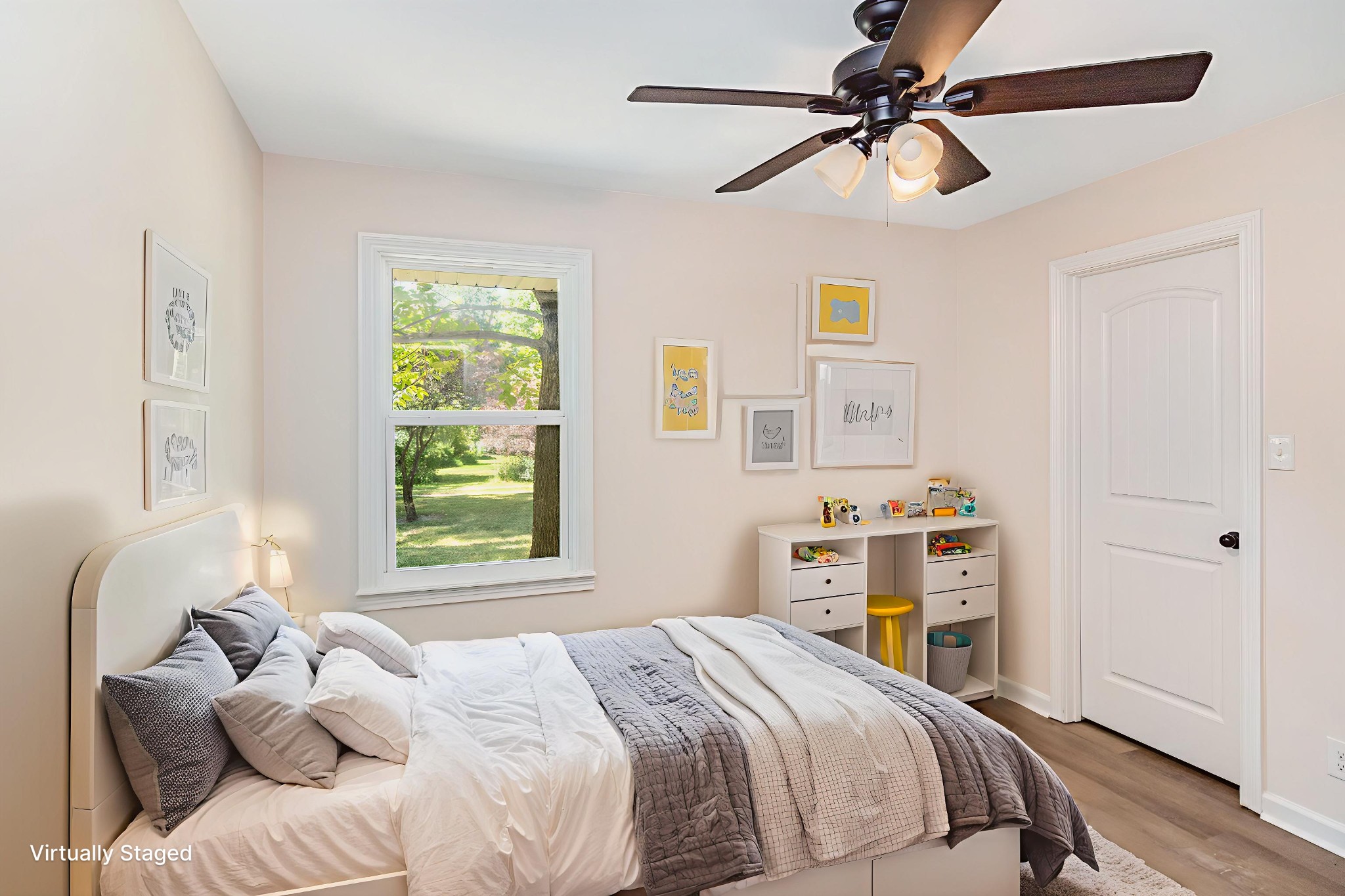 2557 Woodlawn Road Woodlawn, TN 37191 - Photo 31 of 40 a bedroom with a bed ceiling fan and a window
