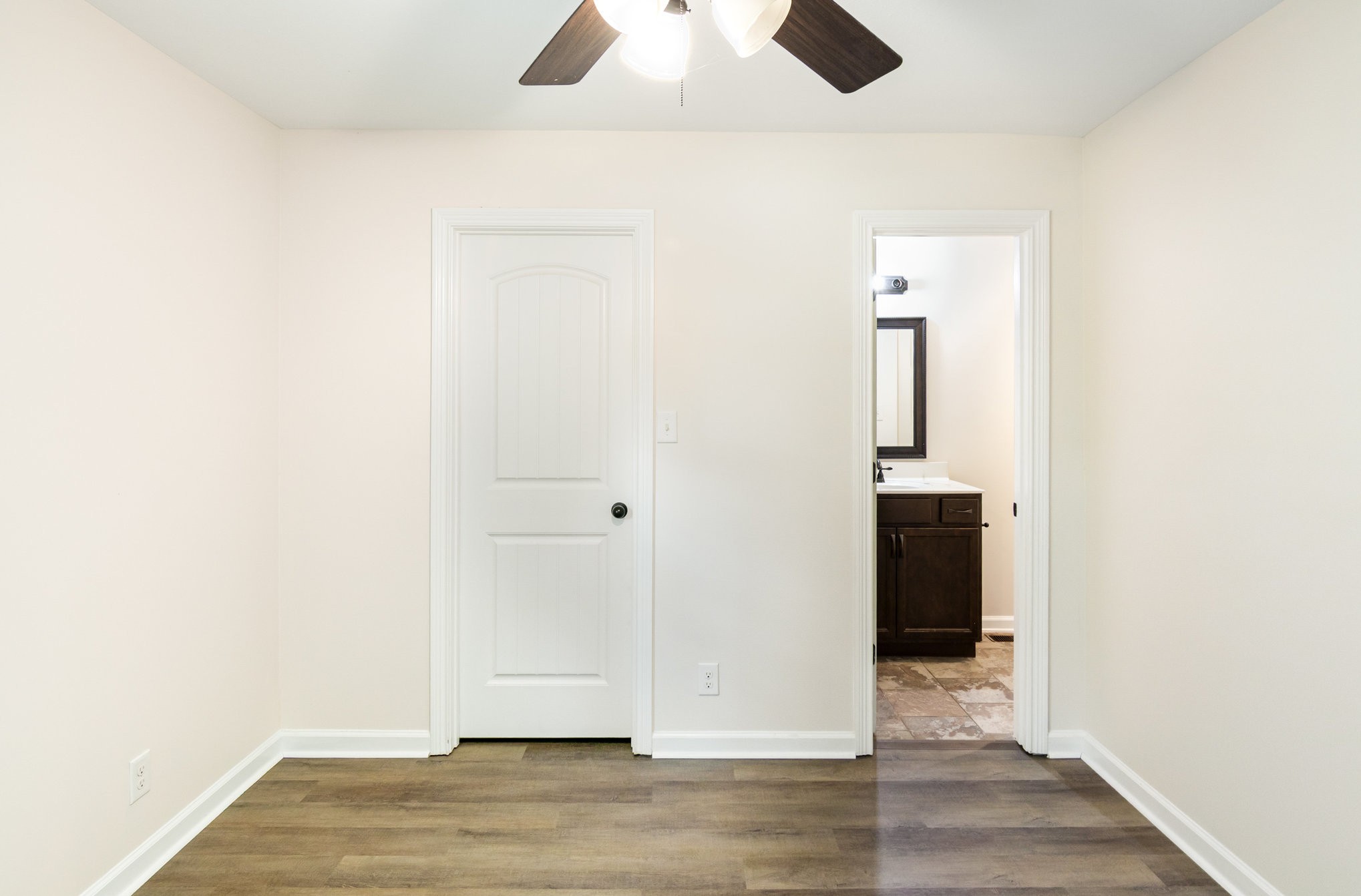 2557 Woodlawn Road Woodlawn, TN 37191 - Photo 36 of 40 a view of an empty room with wooden floor