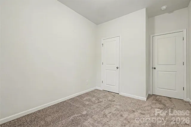 a stove top oven sitting inside of a kitchen