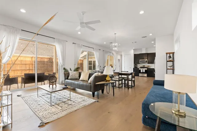 a living room with furniture and a table