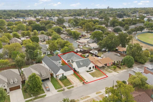 an aerial view of residential house with outdoor space