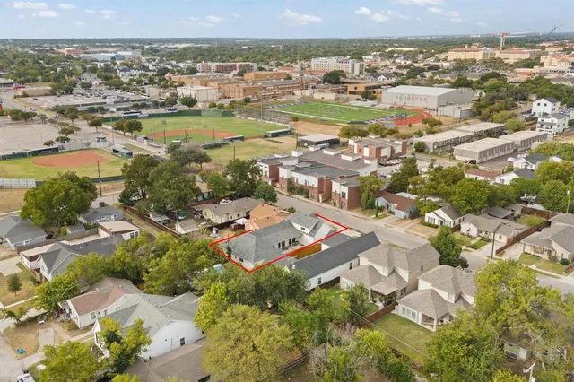 an aerial view of residential building with outdoor space