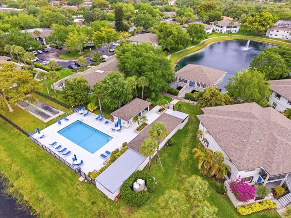 an aerial view of a house with a garden